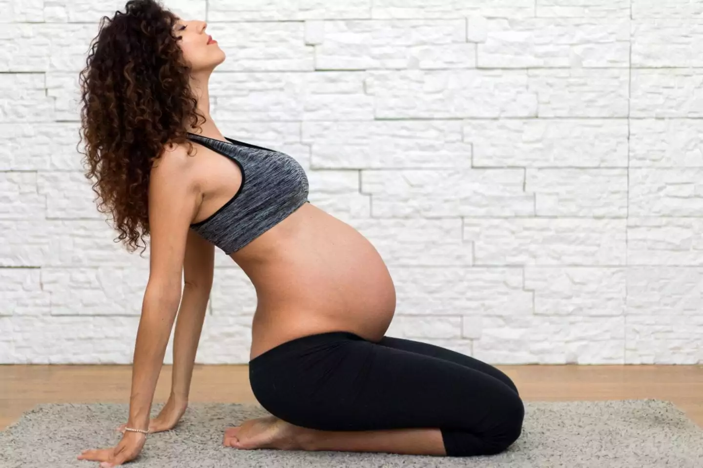 exercising-during-pregnancy-tips-for-staying-safe-woman-exercising-at-home